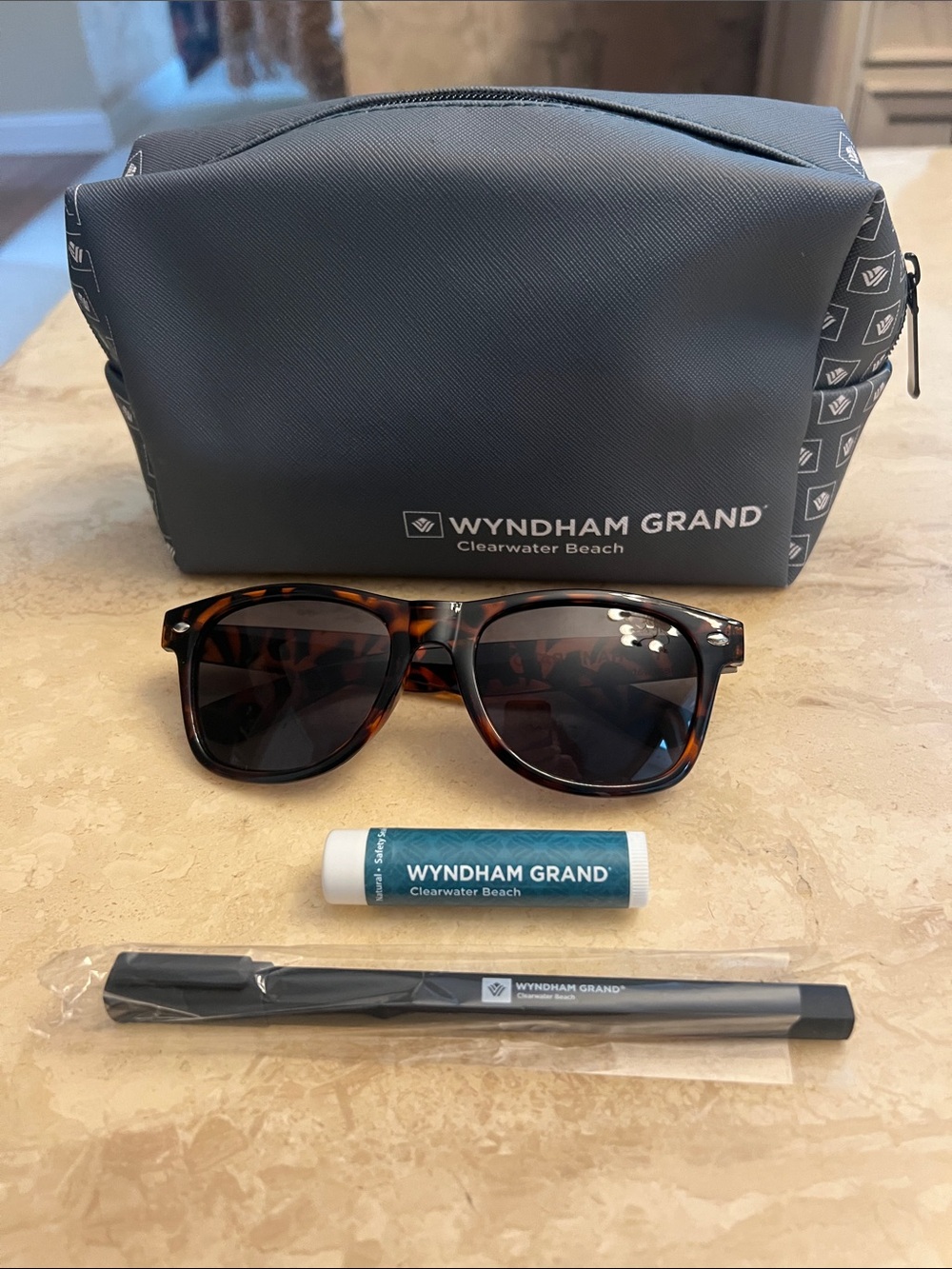 Wyndham Grand Clearwater Beach Toiletry Bag, SunGlasses, Pen, Lipbalm